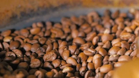 Mixing roasted coffee beans Stock Footage 92541710