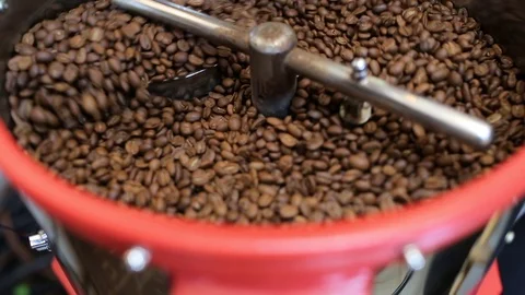 Mixing roasted coffee. Coffee roaster cooling down freshly roasted coffee beans Stock Footage 76346712