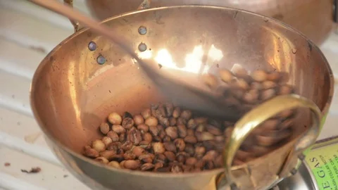 Mixing roasted coffee Stock Footage 90603783