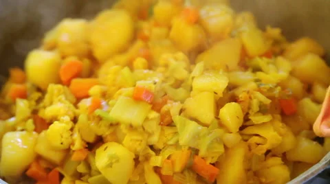 Mixing sabzi with beans Stock Footage 40889536