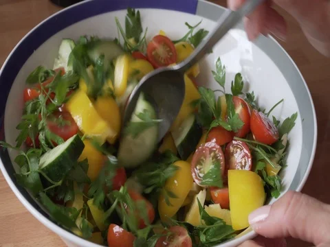Mixing salad in a bowl. 2x timelapse Stock Footage 80508230