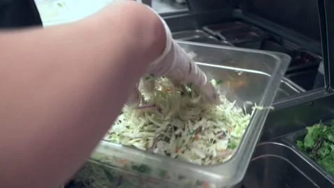 Mixing Salad with Gloves Video stock 90861815