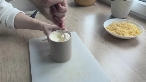 Mixing Sauce In Cup Preparing Dressing For Eggplant Dish Cooking Process Kitchen Video stock 336446436