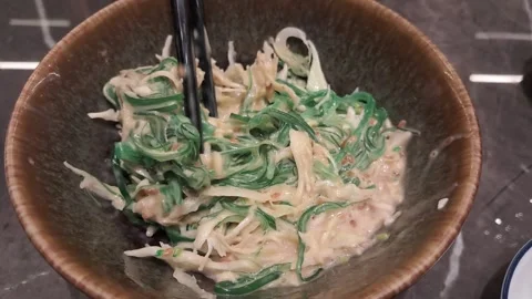 Mixing Savory Green Vegetable Dish Video stock 335206186