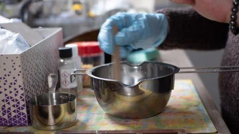 Mixing scent into base mix Stock Photos