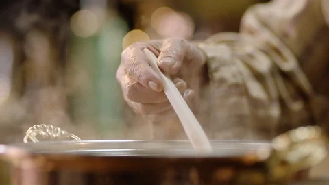 Mixing Soup or Preparing Meal in the Pan in Extreme Slow Motion Stock Footage 121829681