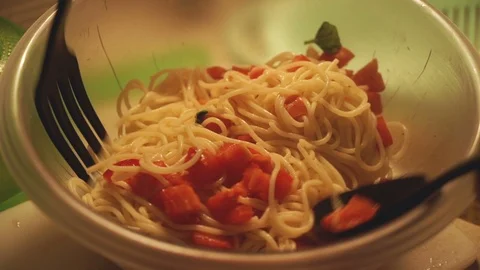 Mixing Spaghetti with Tomato and Basil Video stock 99247894