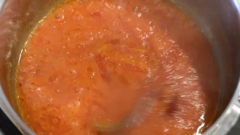 Mixing Spices into Curry Stock Footage 136059423