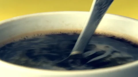 Mixing sugar in the cup of coffee Stock Footage 68374715