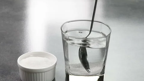 Mixing sugar in water 動画素材 220828443