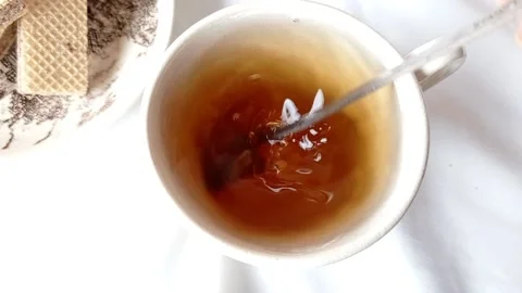 Mixing a sweet tea with a spoon Stock Footage 145561790