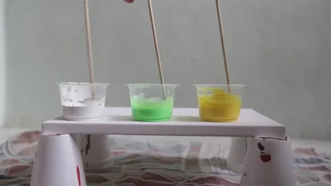 Mixing Three Paints Stock Footage 139265601