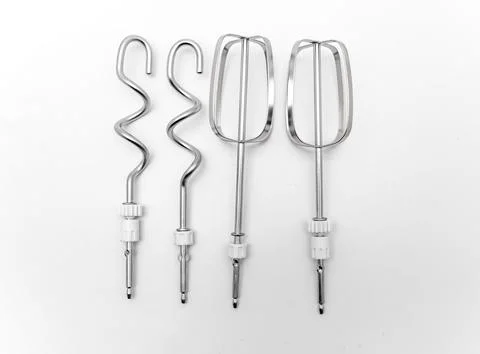 Mixing tools for kitchen use on a plain white background Фото