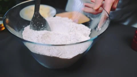 Mixing two different flours with a spoon Stock-Footage 252308006