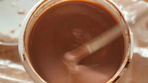 Mixing varnish in a bucket Видео 128418279