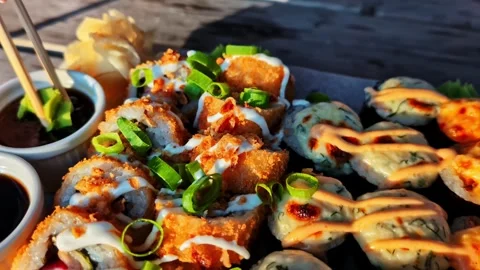 Mixing Wasabi Paste into Soy Sauce with Chopsticks for Sushi Meal Video stock 315423419
