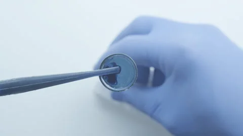 Mixing with water in a test tubes. Stock Footage 248222197