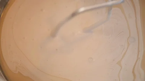 Mixing white paint in a bucket Видео 128418059