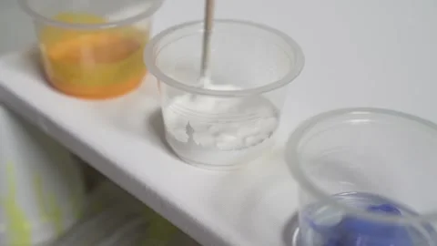 Mixing White Paint Stock-Footage 139265754
