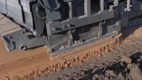 Mixture and laying of a sand layer on a road section, technology, sand Stock Footage 300870561