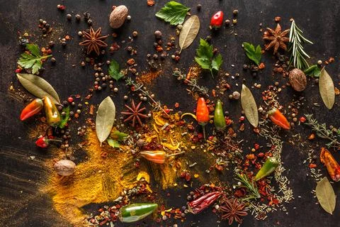 A mixture of different spices close up. Textures of colorful spices and condi Stock Photos