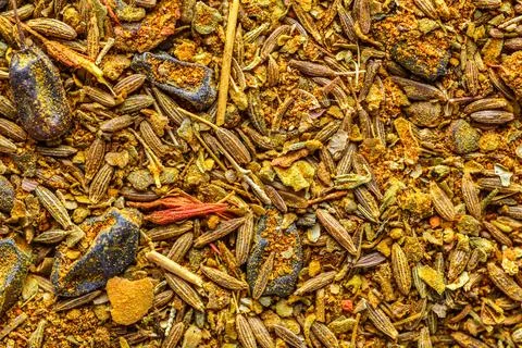 A mixture of different spices close up. Textures of colorful spices and condi Stock Photos