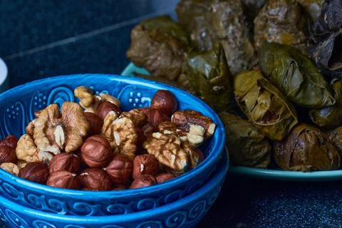 A mixture of nuts in bulk. pistachios almonds hazelnuts walnuts Stock Photos