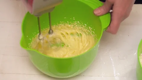 Mixture stirring with the mixer slow motion Stock Footage 74471838