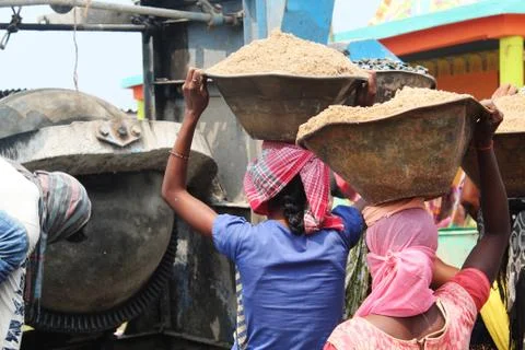 Mixture unloading and labour waiting with sand Stock Photos
