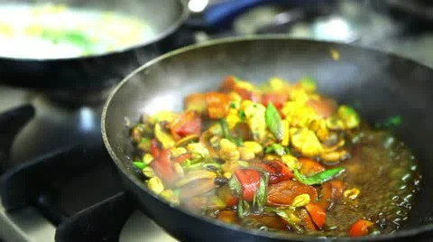 Mixture of vegetables and meat in a pan Stock Footage 24672063