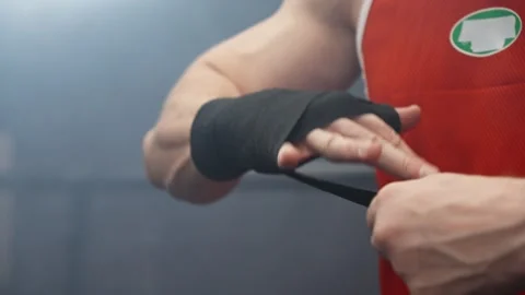 Mma fighter preparing for fight. Close-up of young athlete getting ready Stock Footage 274988048
