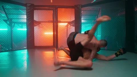 MMA fighters enter the cage ring. Mixed martial arts fight. Stock Footage 238551374