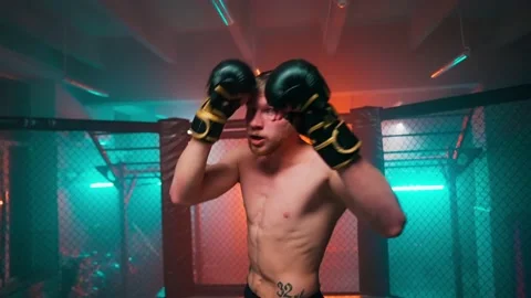 MMA fighters enter the cage ring. Mixed martial arts fight. Stock Footage 238551571