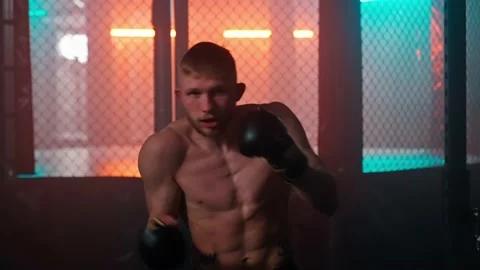 MMA fighters enter the cage ring. Mixed martial arts fight. Stock Footage 238552131