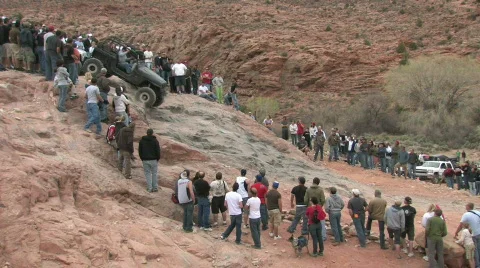 Moab two jeeps crawl down hill M HD Video stock 365473