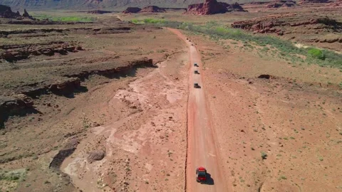 Moab, Utah | Chasing jeeps in canyon with drone Stock Footage 182684628