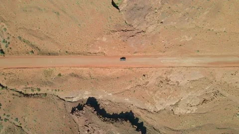 Moab, Utah | Top-down shot of RZRs in Moab canyon. Stock Footage 182684036