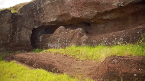 Moai carved out from rock  on Easter Island Video stock 64258770