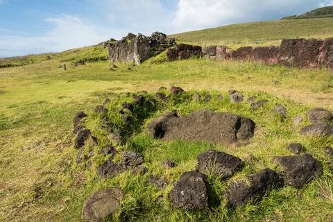 The Moai statue with only its face exposed at Ahu Vinapu and Site No. 2, Ea.. Stock Photos
