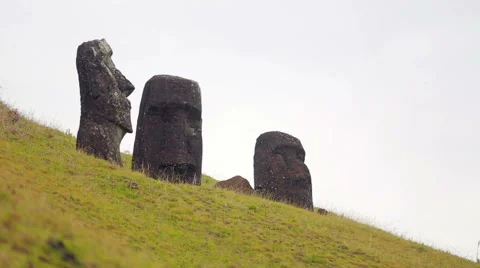 Moai Statues on the hillside Stock Footage 64258496