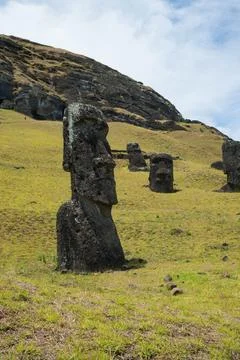The moai statues standing on the slopes of Rano Raraku Stock Photos