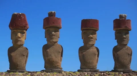 Moai statues under the clear blue sky Stock Footage 64258841