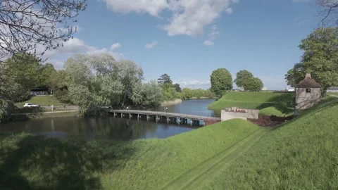 Moat, footbridge and sentry box at Kastellet in spring Stock Footage 341288959