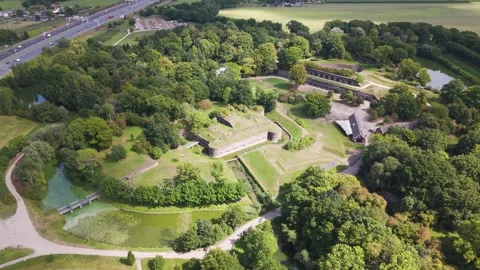 Moated fort complex thick green embankments rectangular defensive structures Video stock 327945957