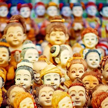 Mob of doll faces Stock Photos