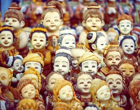 Mob of doll faces Stock Photos