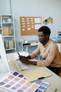 Mobile App Designer at Workplace Stock Photos
