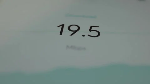 Mobile app performing an internet speed test and displaying the result for Stock Footage 328345191
