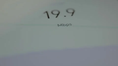 Mobile app performing an internet speed test and displaying the result for Stock Footage 328345206