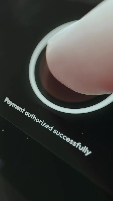 Mobile app screen showing Hold to Pay and successful transaction Stock Footage 332501182